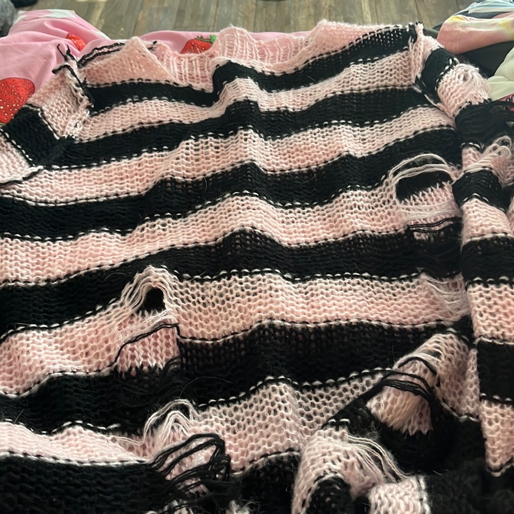 Ripped Pink and black striped sweater
